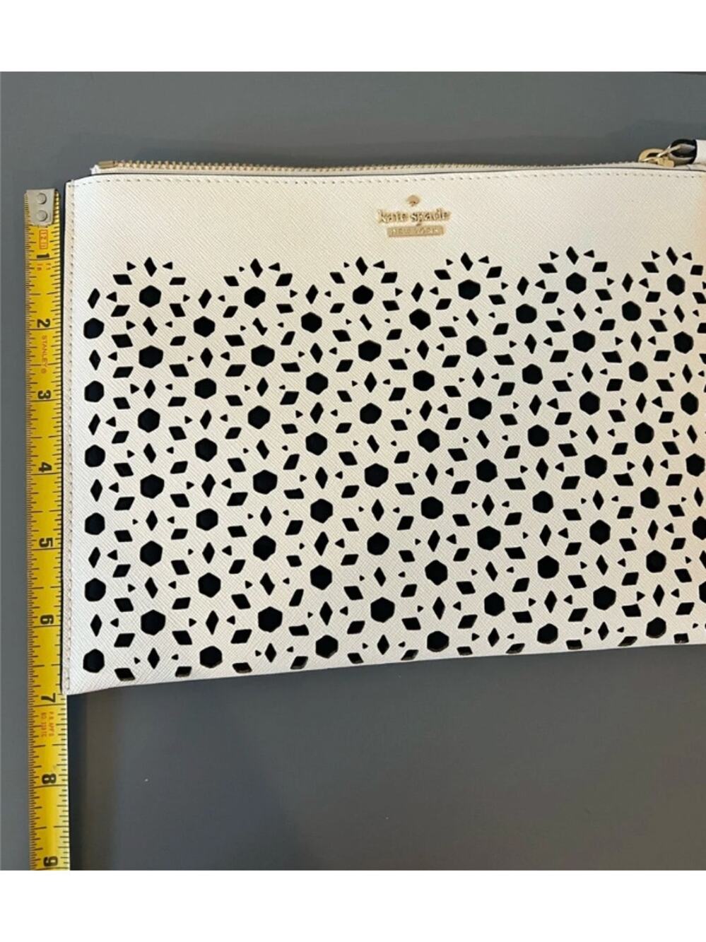 kate spade White Laser-Cut Perforated Wristlet Clutch